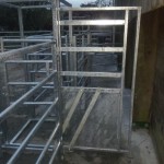 Cattle handling system's side opening gate