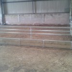 Sheep feed barrier with removable extra bar